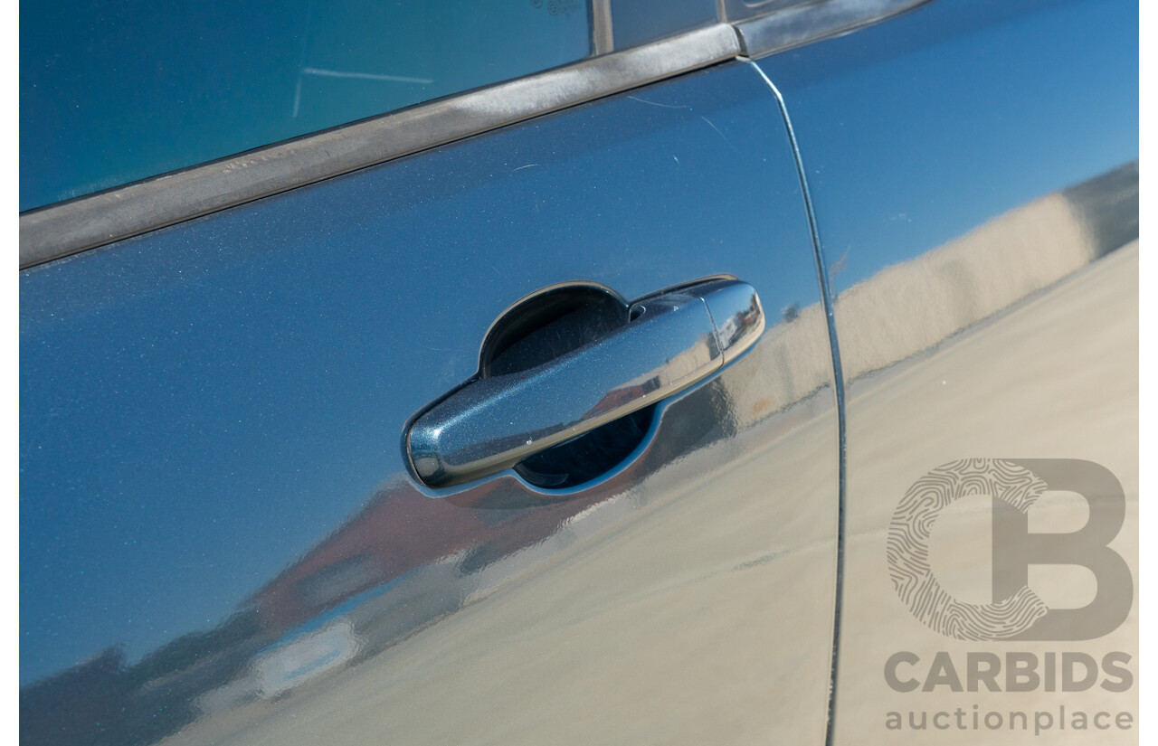 6/2009 Holden Commodore SS-V VE MY09.5 Utility Karma Blue V8 6.0L