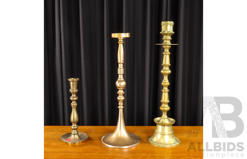 Collection of Three Turned Metal Candle Sticks