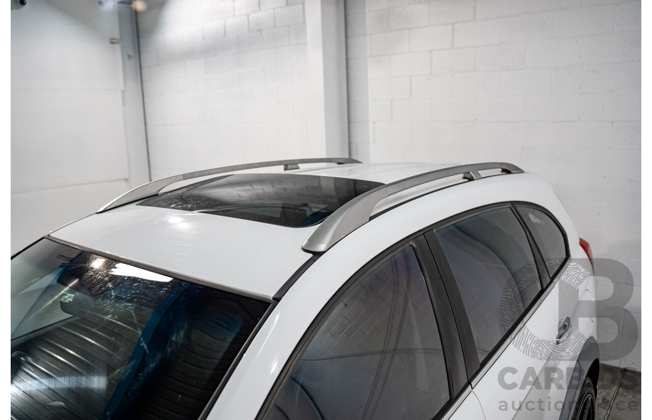 3/2014 Holden Captiva 7 LTZ (AWD) CG MY15 4d Wagon Summit White V6 3.0L - 7 Seater