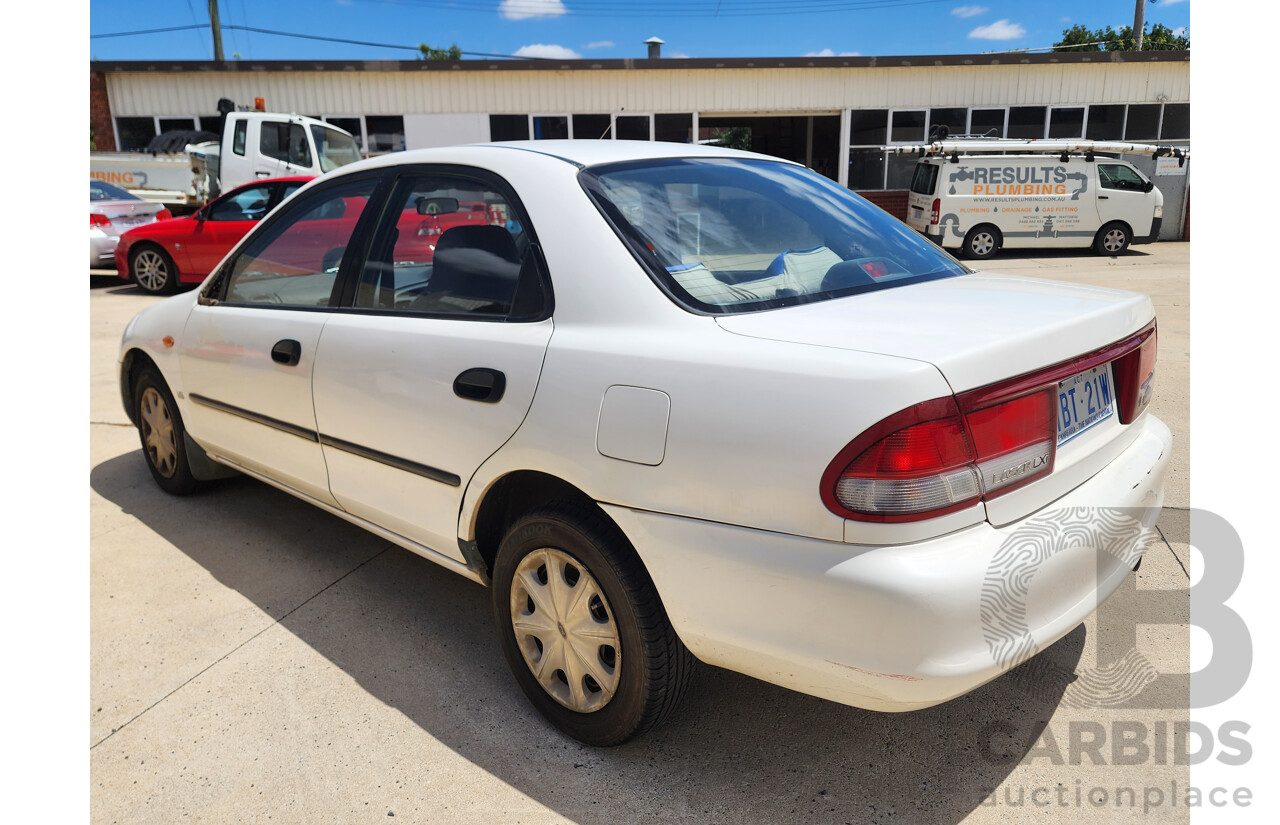 5/1997 Ford Laser LXi KJII 4d Sedan White 1.6L
