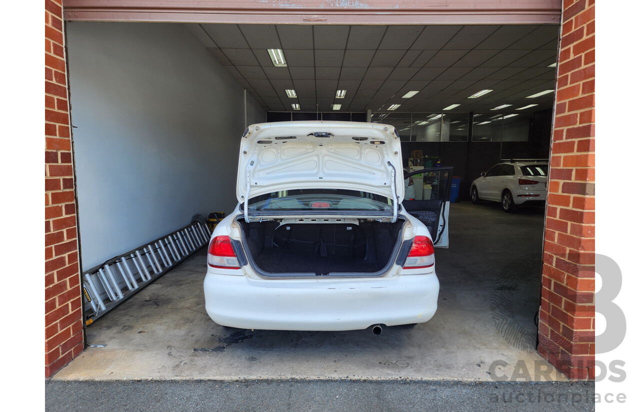 5/1997 Ford Laser LXi KJII 4d Sedan White 1.6L