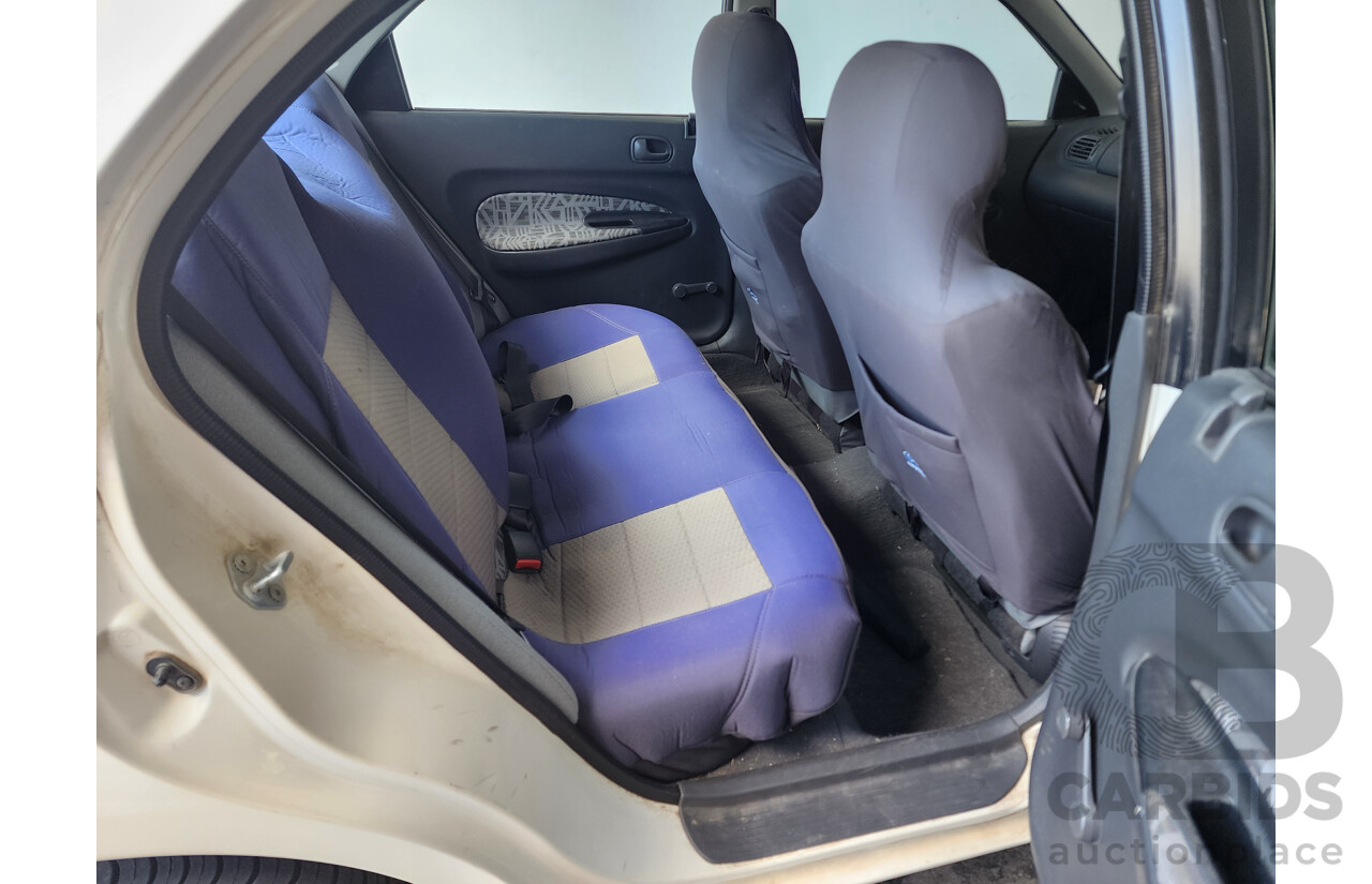 5/1997 Ford Laser LXi KJII 4d Sedan White 1.6L