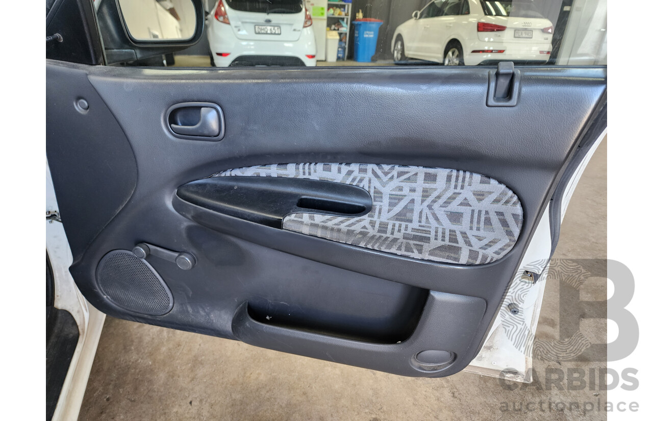 5/1997 Ford Laser LXi KJII 4d Sedan White 1.6L