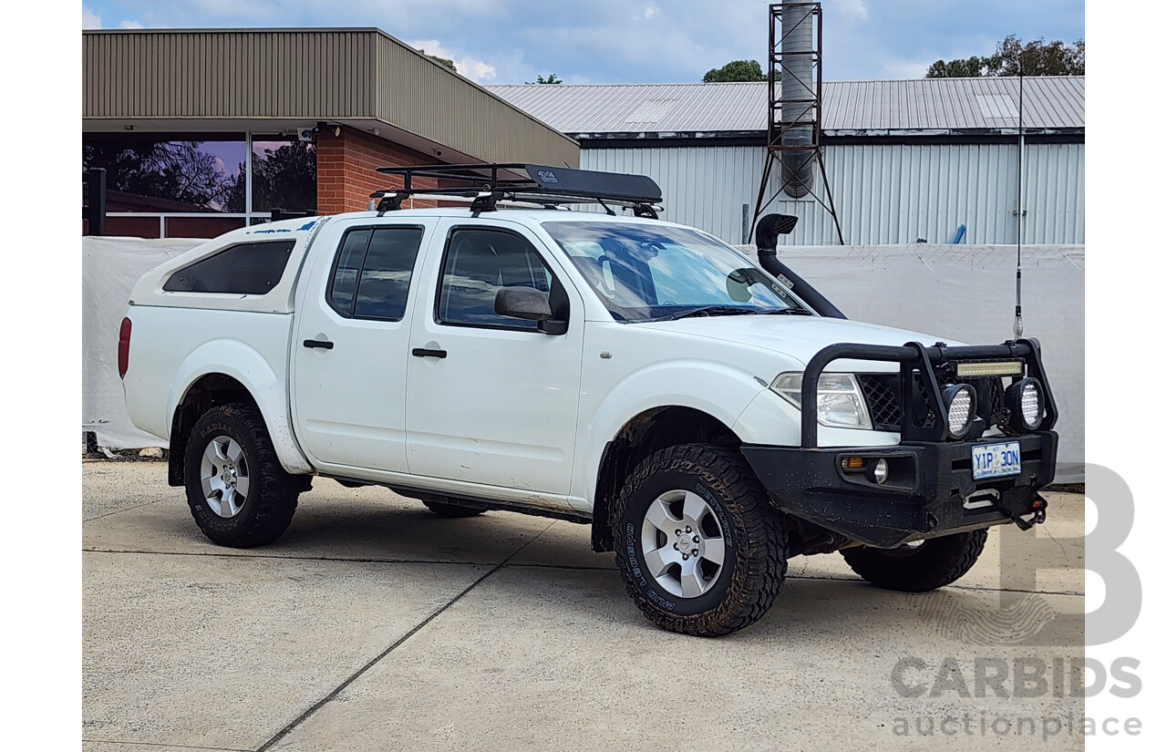 2/2009 Nissan Navara RX (4x4) D40 Dual Cab P/Up White 2.5L