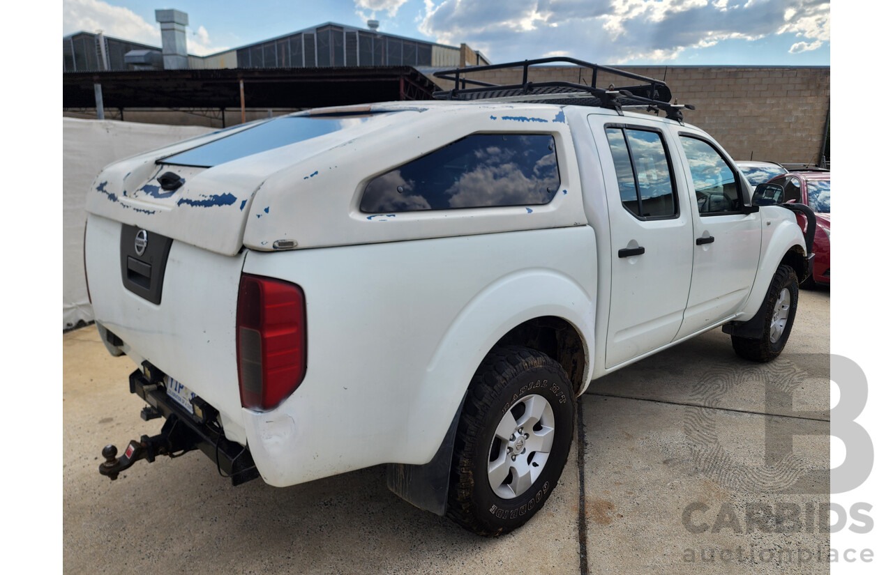 2/2009 Nissan Navara RX (4x4) D40 Dual Cab P/Up White 2.5L