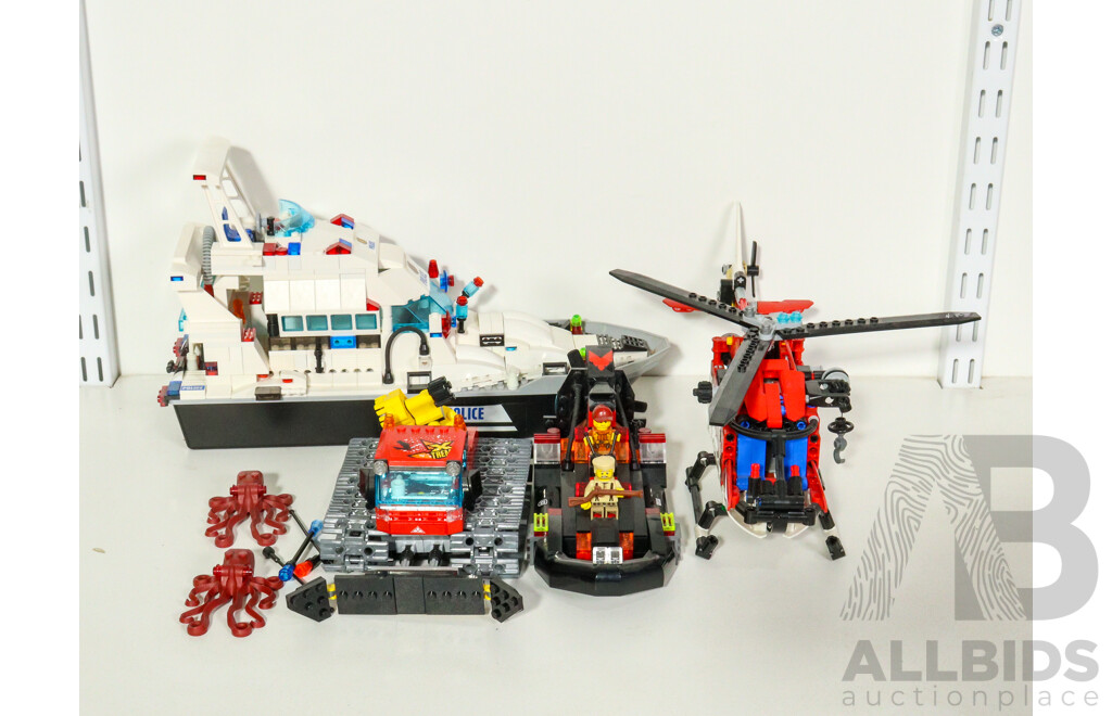 Four Lego Vehicles Including Police Patrol Boat, Rescue Helicopter, City Snow Groomer, Swamp Craft