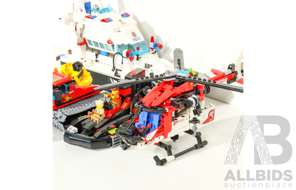 Four Lego Vehicles Including Police Patrol Boat, Rescue Helicopter, City Snow Groomer, Swamp Craft