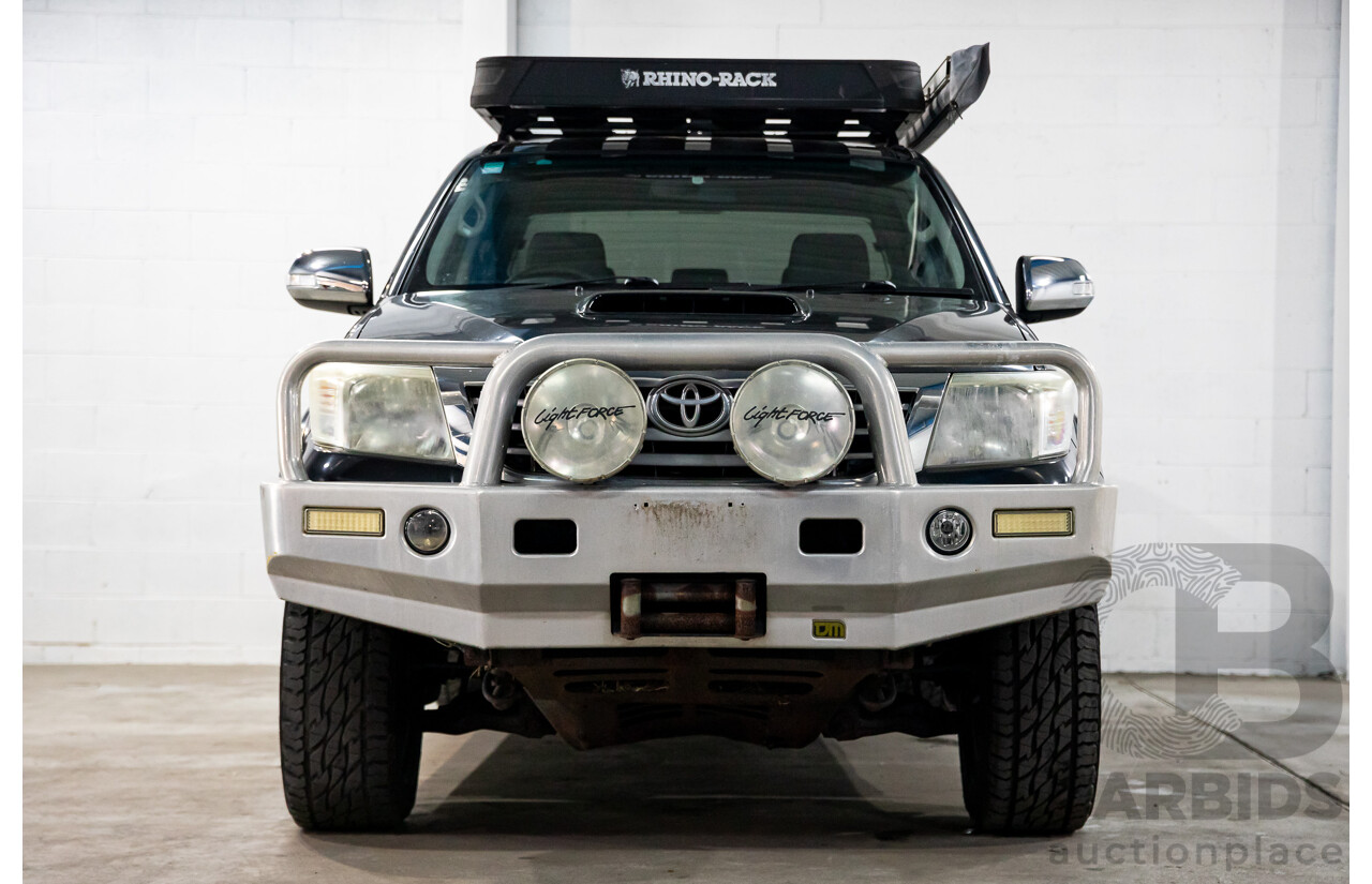 2/2012 Toyota Hilux SR5 (4x4) KUN26R MY12 Dual Cab P/Up Black Mica Turbo Diesel 3.0L