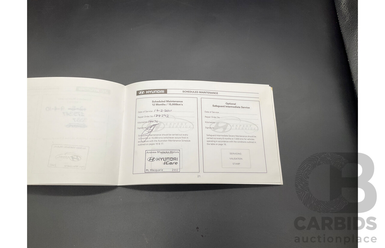 3/2010 Hyundai Santa Fe Elite CRDi (4x4) CM MY10 4d Wagon Vanilla White Turbo Diesel 2.2L - 7 Seater