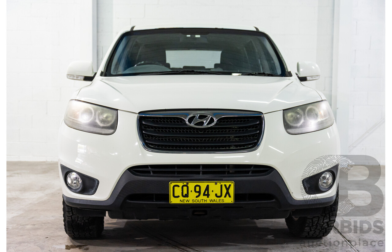 3/2010 Hyundai Santa Fe Elite CRDi (4x4) CM MY10 4d Wagon Vanilla White Turbo Diesel 2.2L - 7 Seater