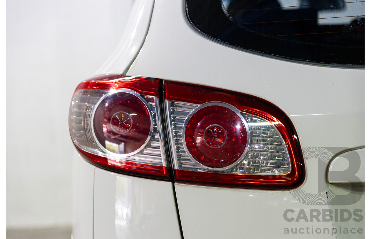 3/2010 Hyundai Santa Fe Elite CRDi (4x4) CM MY10 4d Wagon Vanilla White Turbo Diesel 2.2L - 7 Seater