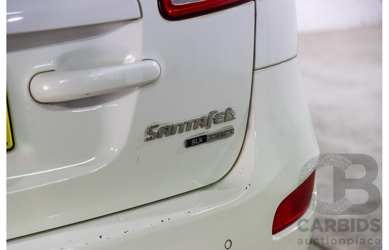 3/2010 Hyundai Santa Fe Elite CRDi (4x4) CM MY10 4d Wagon Vanilla White Turbo Diesel 2.2L - 7 Seater