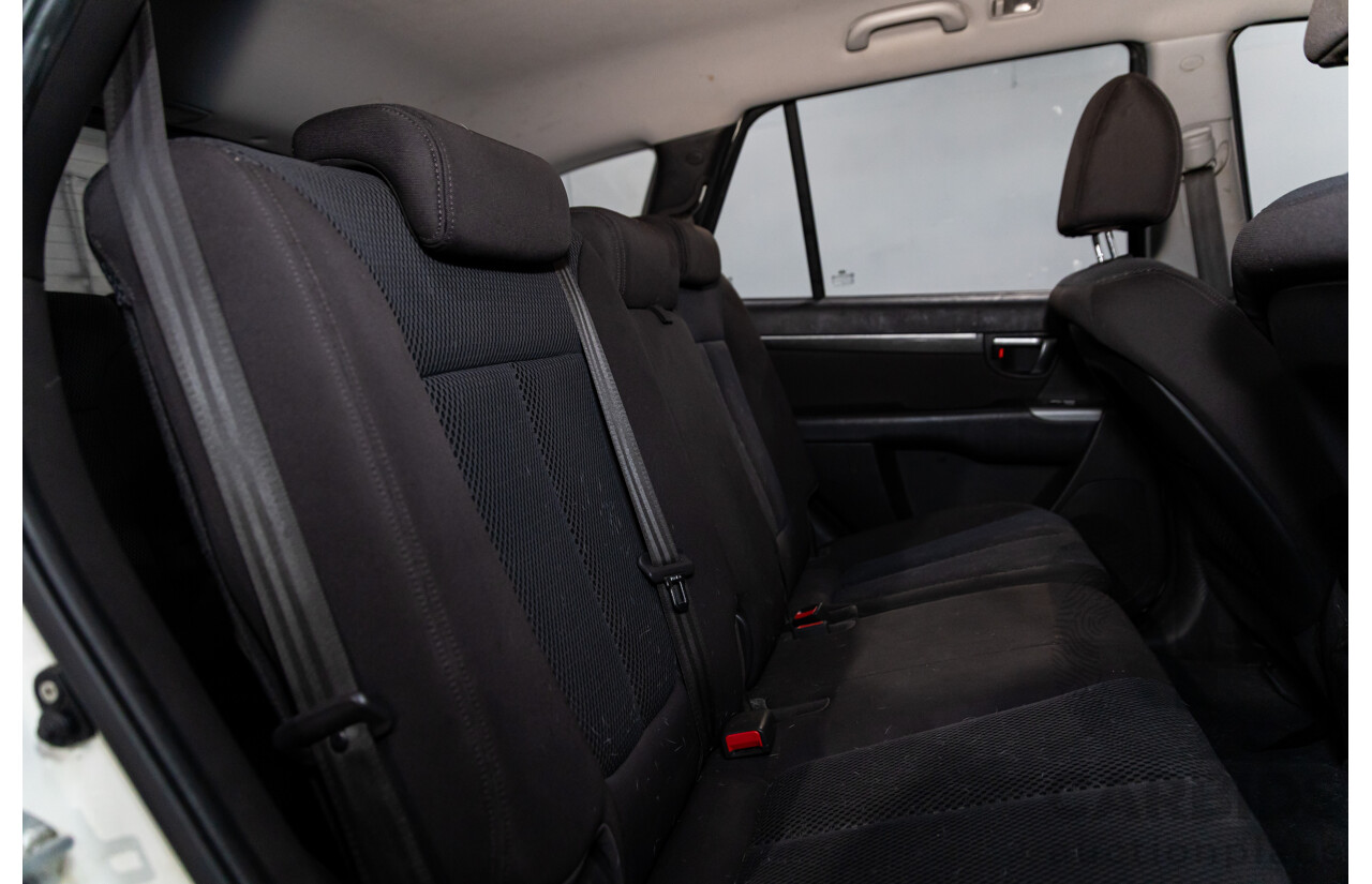 3/2010 Hyundai Santa Fe Elite CRDi (4x4) CM MY10 4d Wagon Vanilla White Turbo Diesel 2.2L - 7 Seater