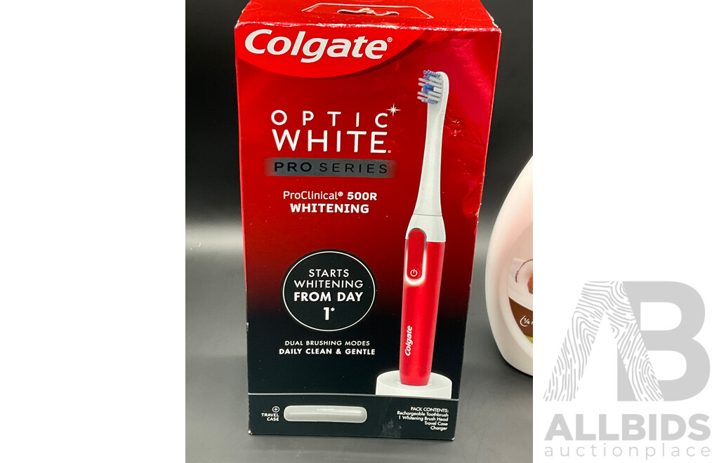 Assorted Cosmetics, Including COLGATE Electric Tooth Brush and Whitening Kit, SCHICK Hydro Silk Trimmer and Razor and More - Lot of 6