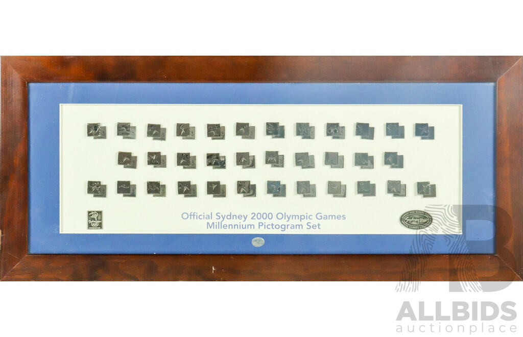 Framed Set of Official Sydney 2000 Olympic Games Millenium Pictograms, 34 x 78 cm (frame)