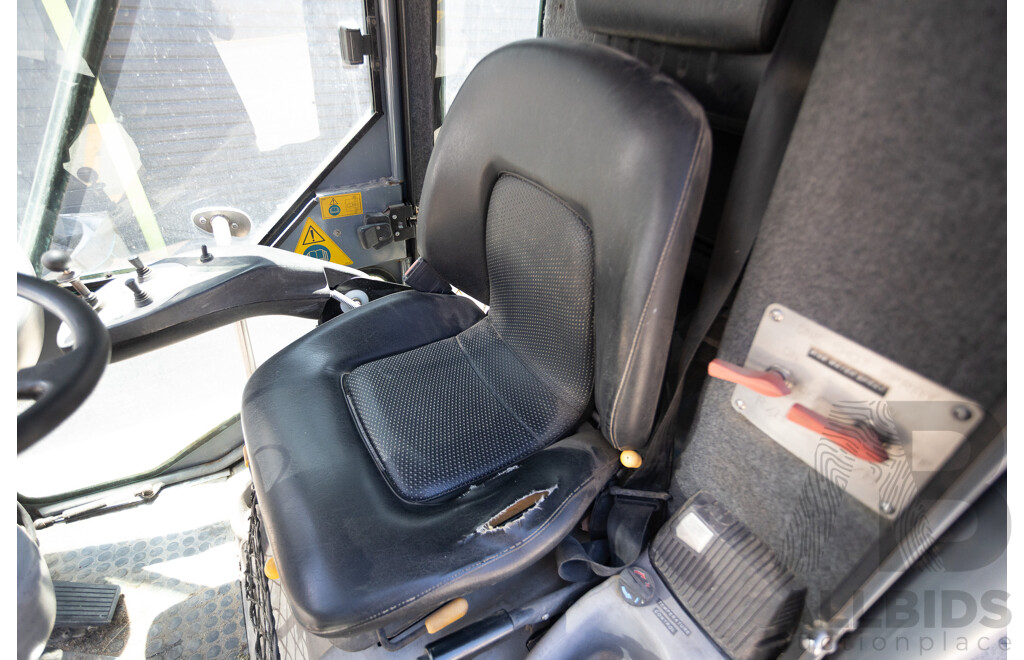 Circa 2009 Green Machine 636HS Air Sweeper (Enclosed A/C Cab)