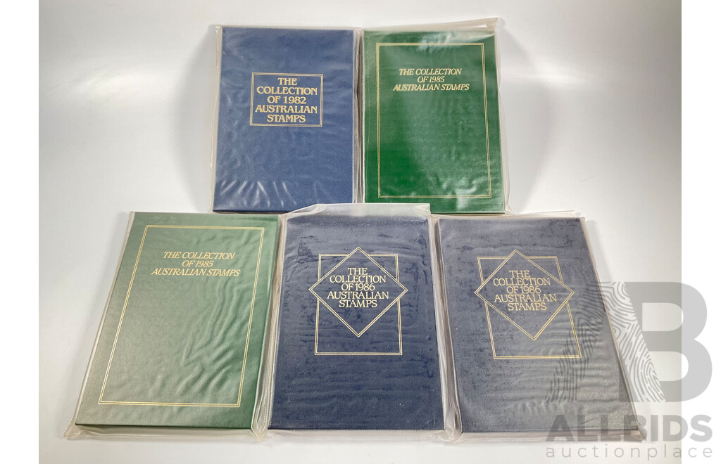 Five Australian Annual Stamp Albums Including 1982, 1985(2) 1986(2)