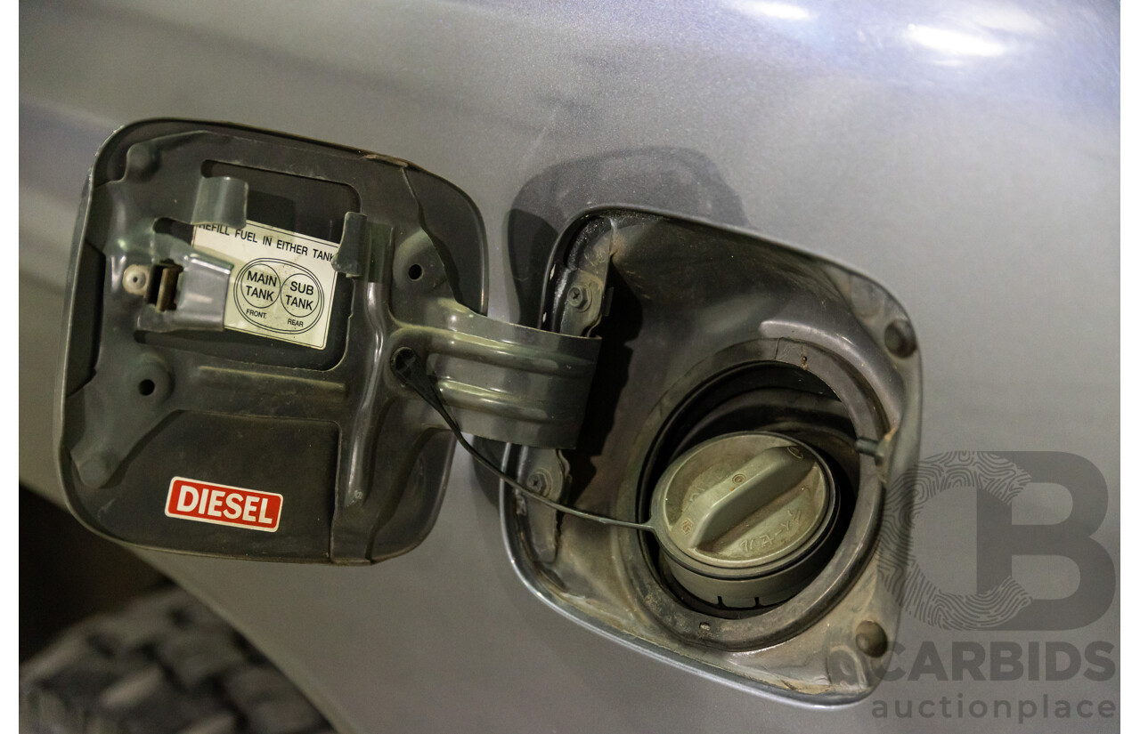 7/2005 Toyota Landcruiser GXL (4x4) HDJ100R Upgrade 4d Wagon Graphite Grey Metallic Turbo Diesel 4.2L