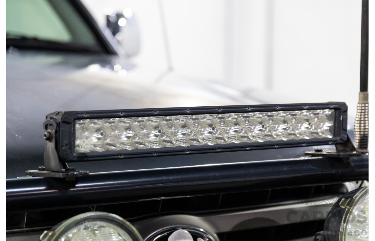 7/2005 Toyota Landcruiser GXL (4x4) HDJ100R Upgrade 4d Wagon Graphite Grey Metallic Turbo Diesel 4.2L