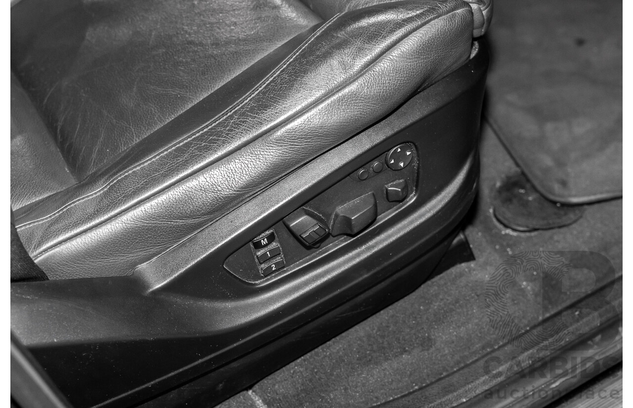 7/2011 BMW X5 M (AWD) E70 MY10 4d Wagon Black Sapphire Metallic Twin Turbo V8 4.4L