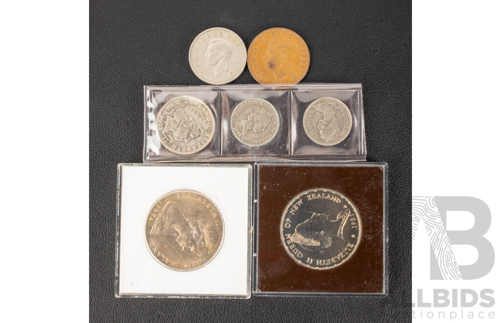 Seven Assorted New Zealand coins.