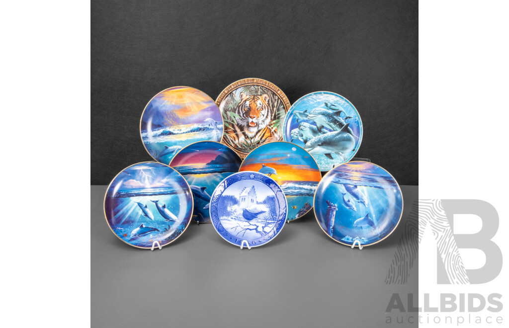 Collection of Eight Display Plates Including Royal Copenhagen 1966 Blackbird at Christmas, Franklin Mint Dolphins and Tiger, Bradford Exchange