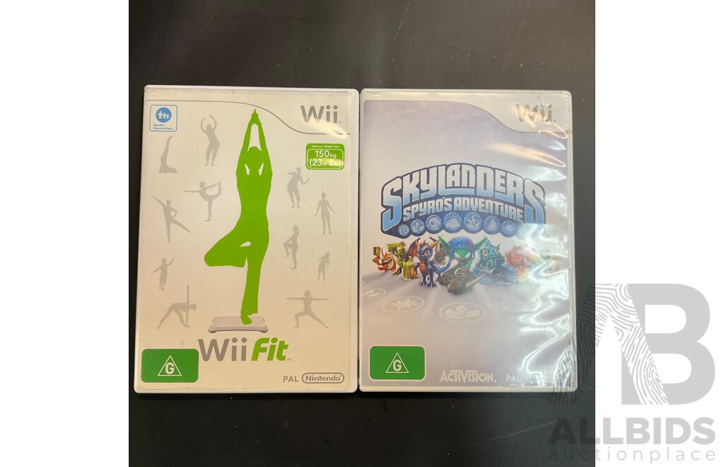 Nintendo Wii Console with Wii Fit Plus and MarioKart Game/Steering Wheel & Sports Pact 8 in 1 for Wii Sports Resort