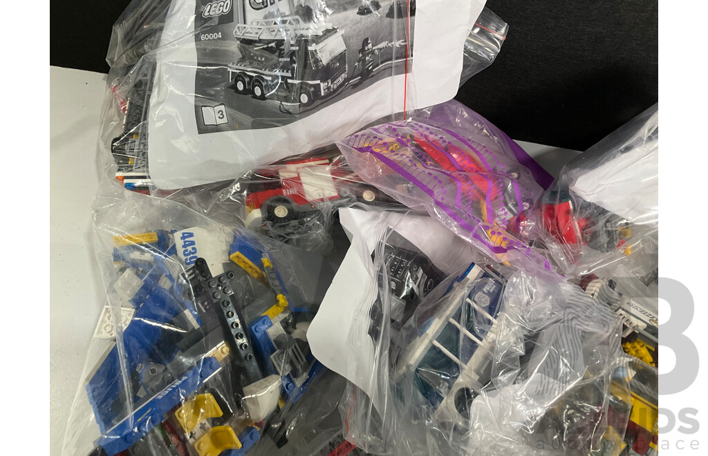 Box of Various Constructed Lego Vehicles