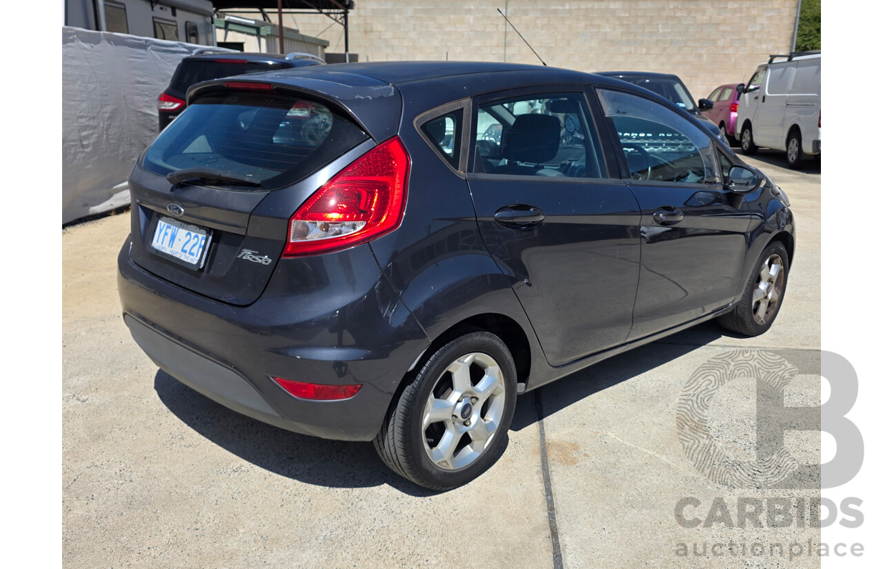 10/2009 Ford Fiesta LX WS 5d Hatchback Grey 1.6L