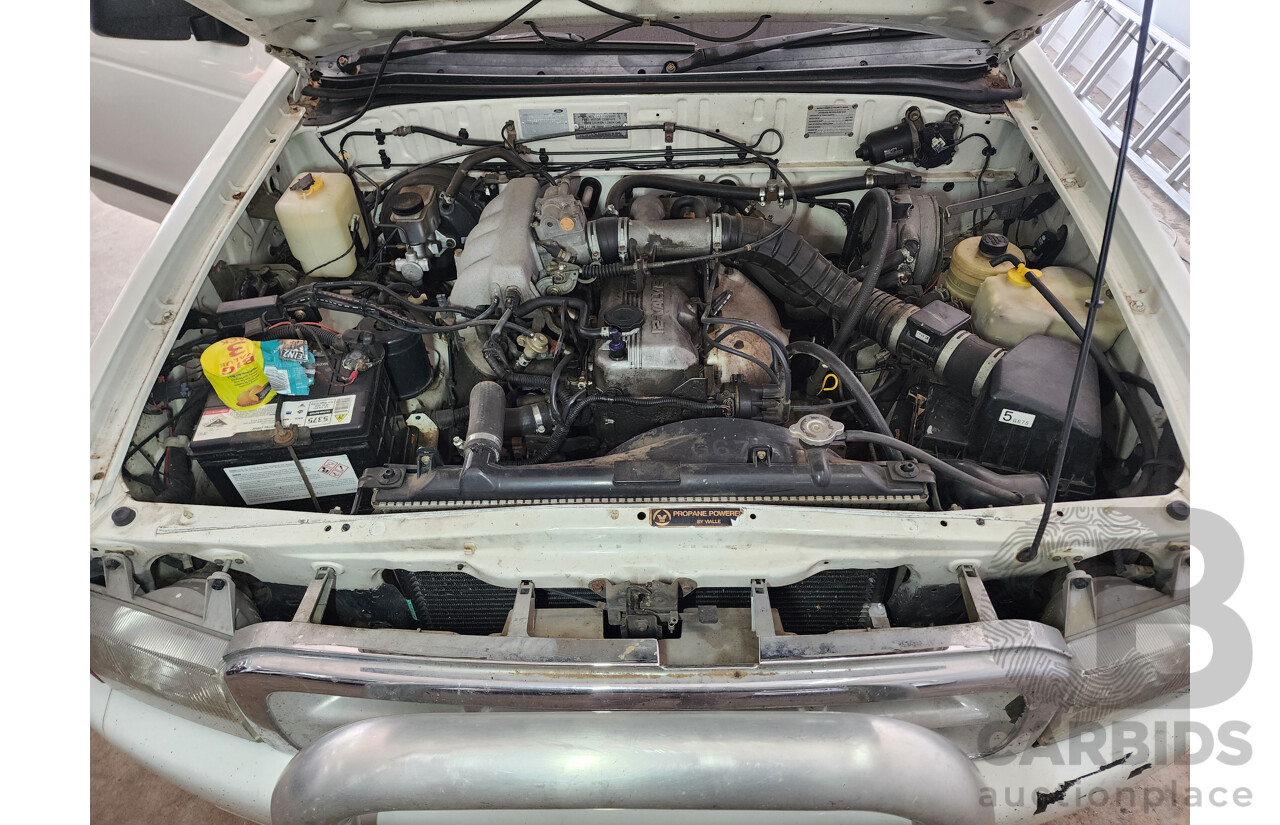 1/2000 Ford Courier XL PE Crew Cab P/Up White 2.6L