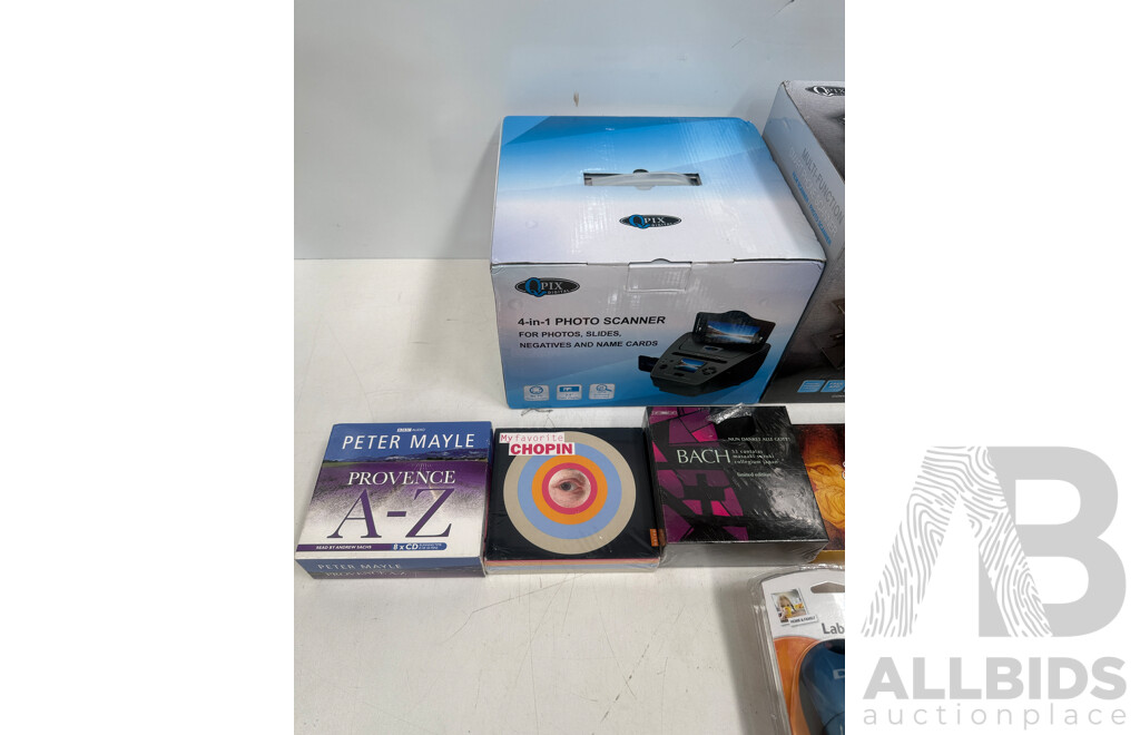 CDs Assorted, Scanners X 2, Label Maker X 1.