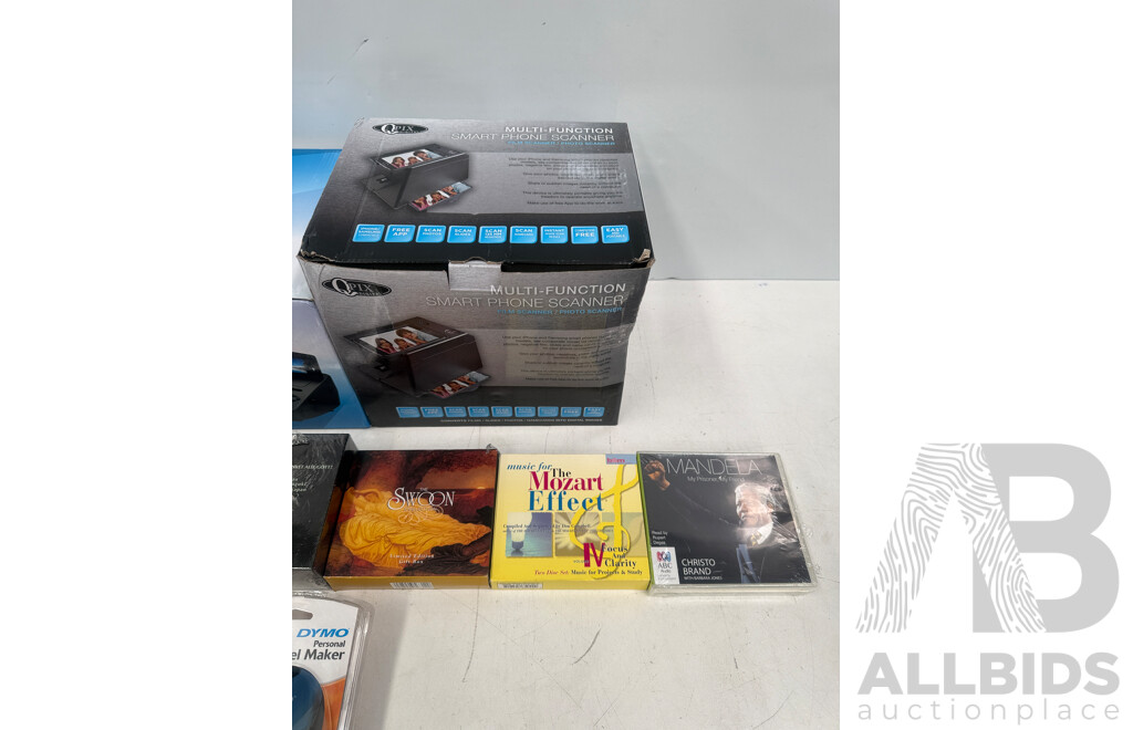 CDs Assorted, Scanners X 2, Label Maker X 1.