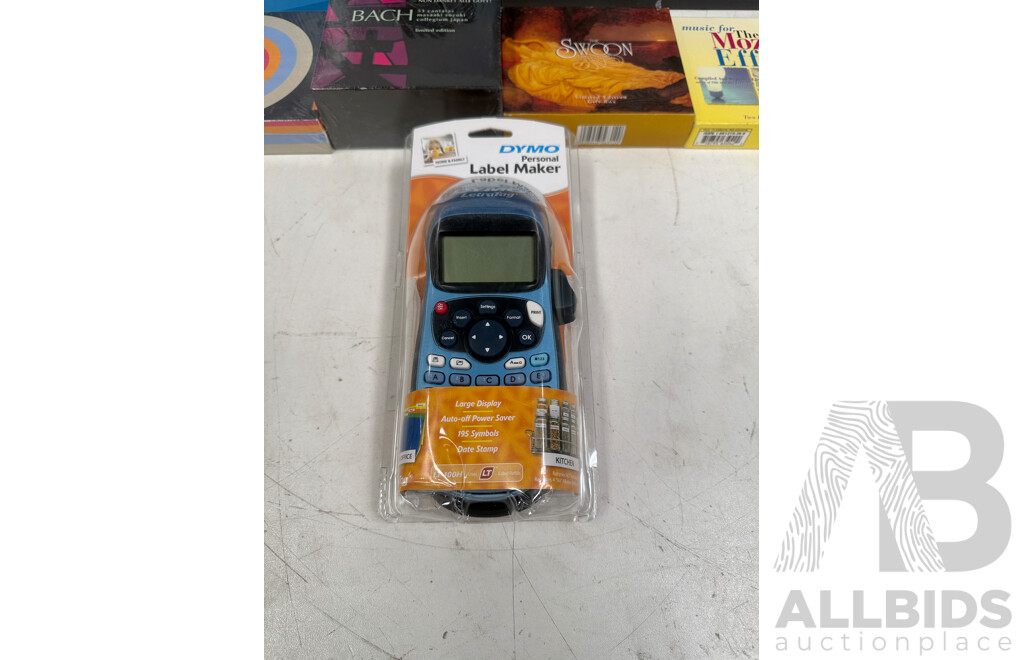 CDs Assorted, Scanners X 2, Label Maker X 1.