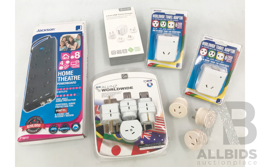 Assorted Electronics Including Powerboard, Travel Charger, and Power Adaptors