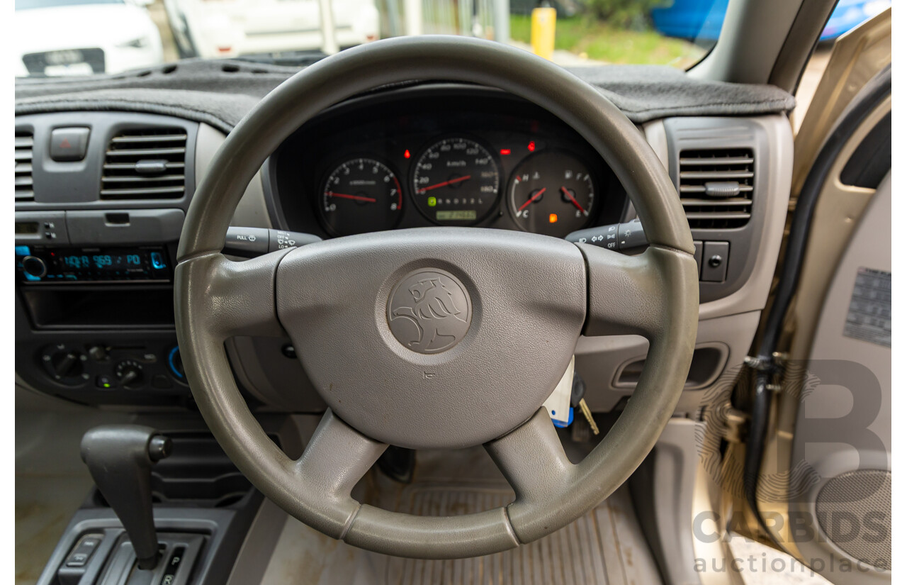 9/2003 Holden Rodeo LX RA C/Chas Satin Gold Metallic V6 3.5L - LPG Dual Fuel