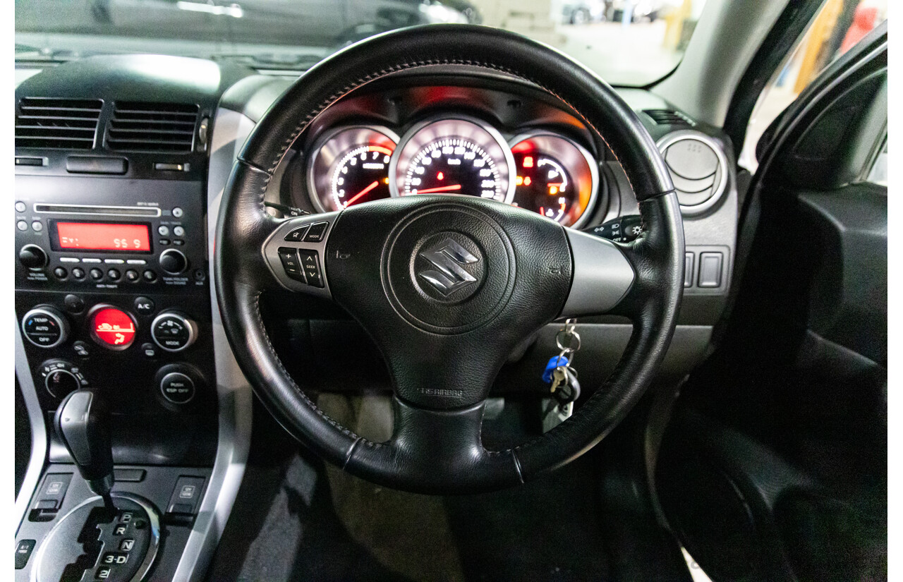 2/2010 Suzuki Grand Vitara (4x4) JT MY08.5 2d Wagon Silky Silver Metallic 2.4L