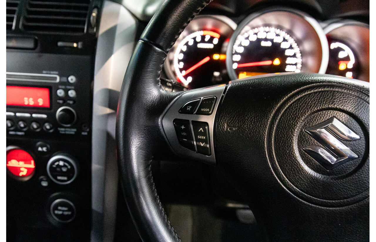 2/2010 Suzuki Grand Vitara (4x4) JT MY08.5 2d Wagon Silky Silver Metallic 2.4L