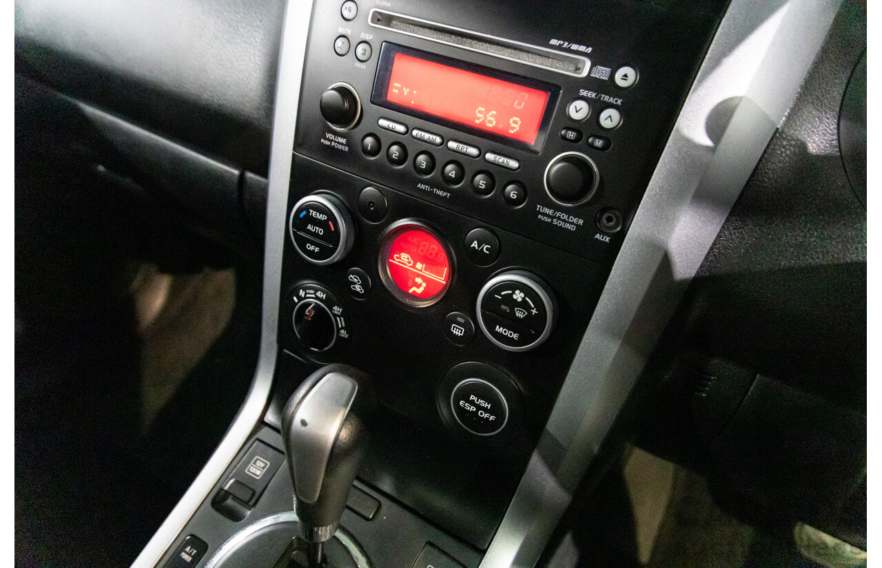 2/2010 Suzuki Grand Vitara (4x4) JT MY08.5 2d Wagon Silky Silver Metallic 2.4L