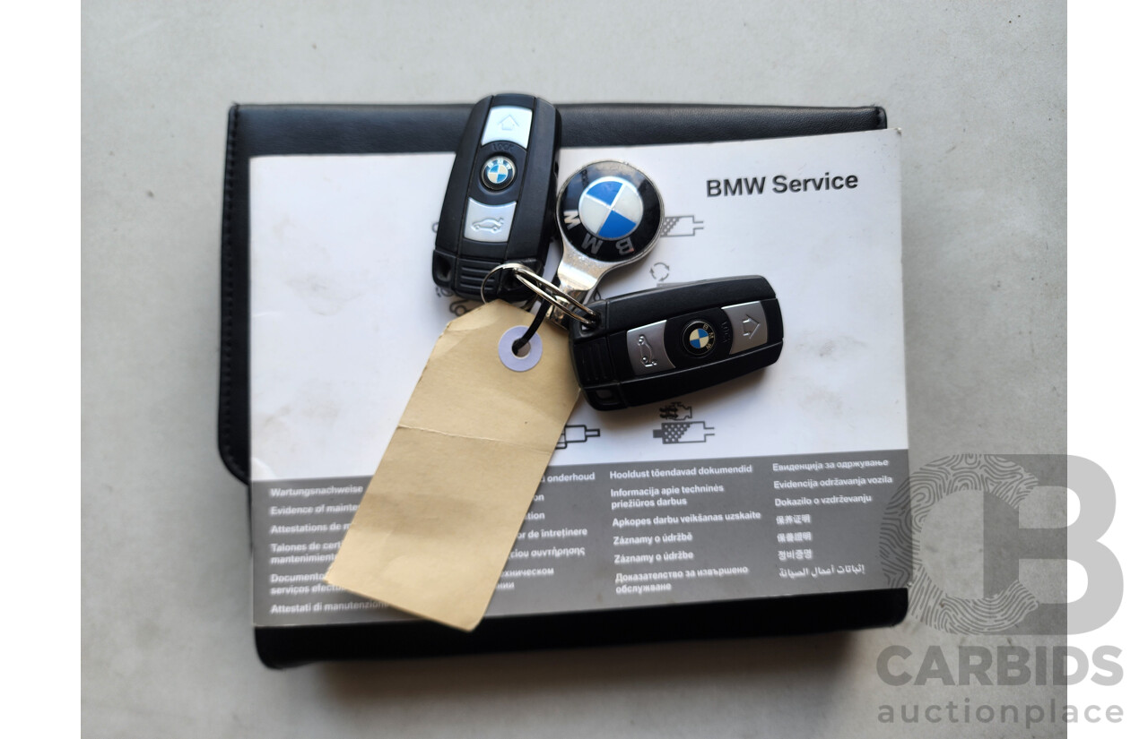 10/2010 Bmw X5 Xdrive 50i Sport E70 MY10 4d Wagon Black 4.4L