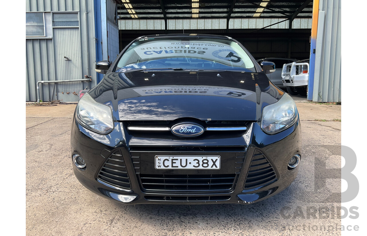 10/2011 Ford Focus Titanium LW 4d Sedan Ebony Black Metallic 2.0L