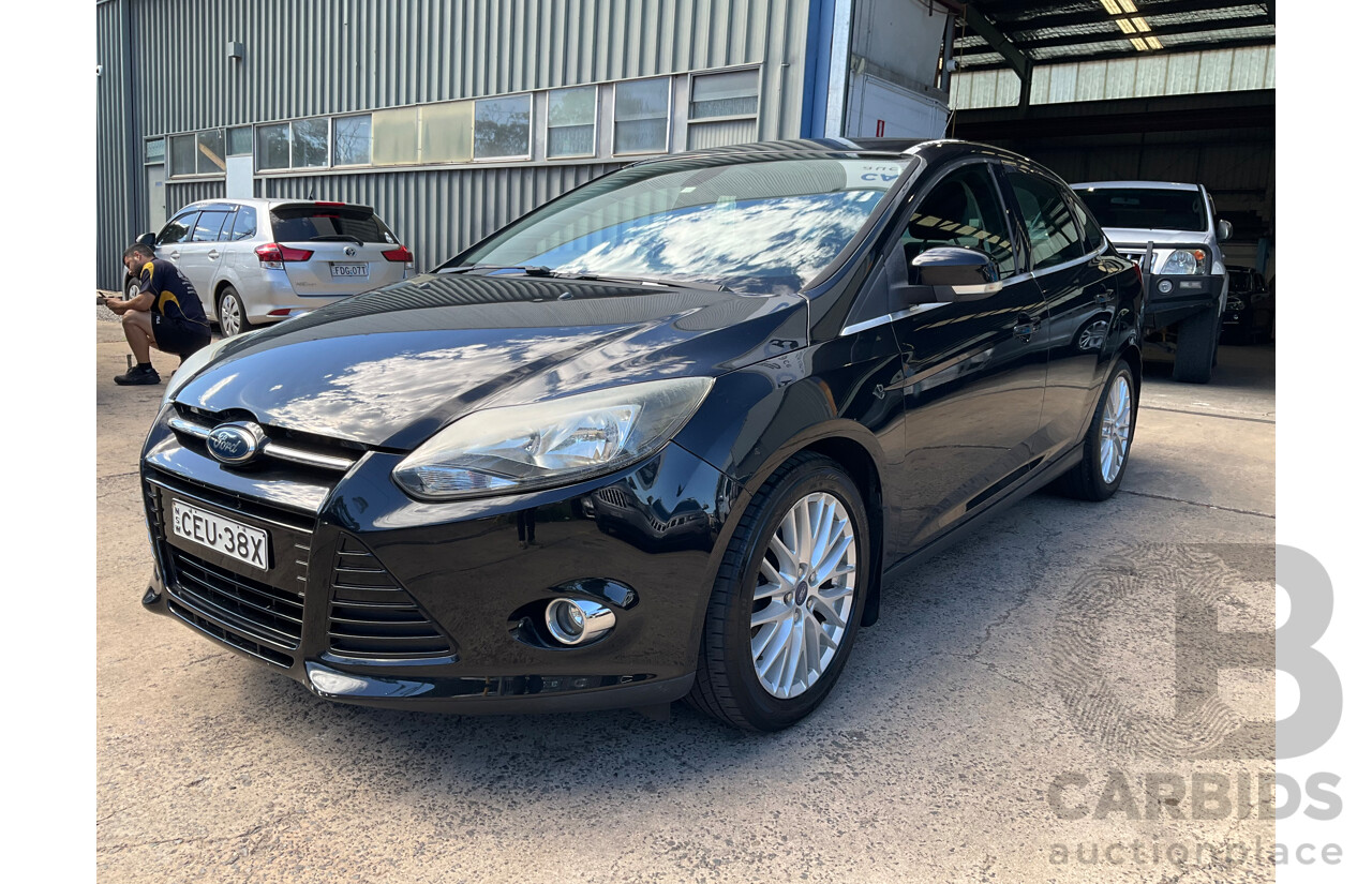10/2011 Ford Focus Titanium LW 4d Sedan Ebony Black Metallic 2.0L