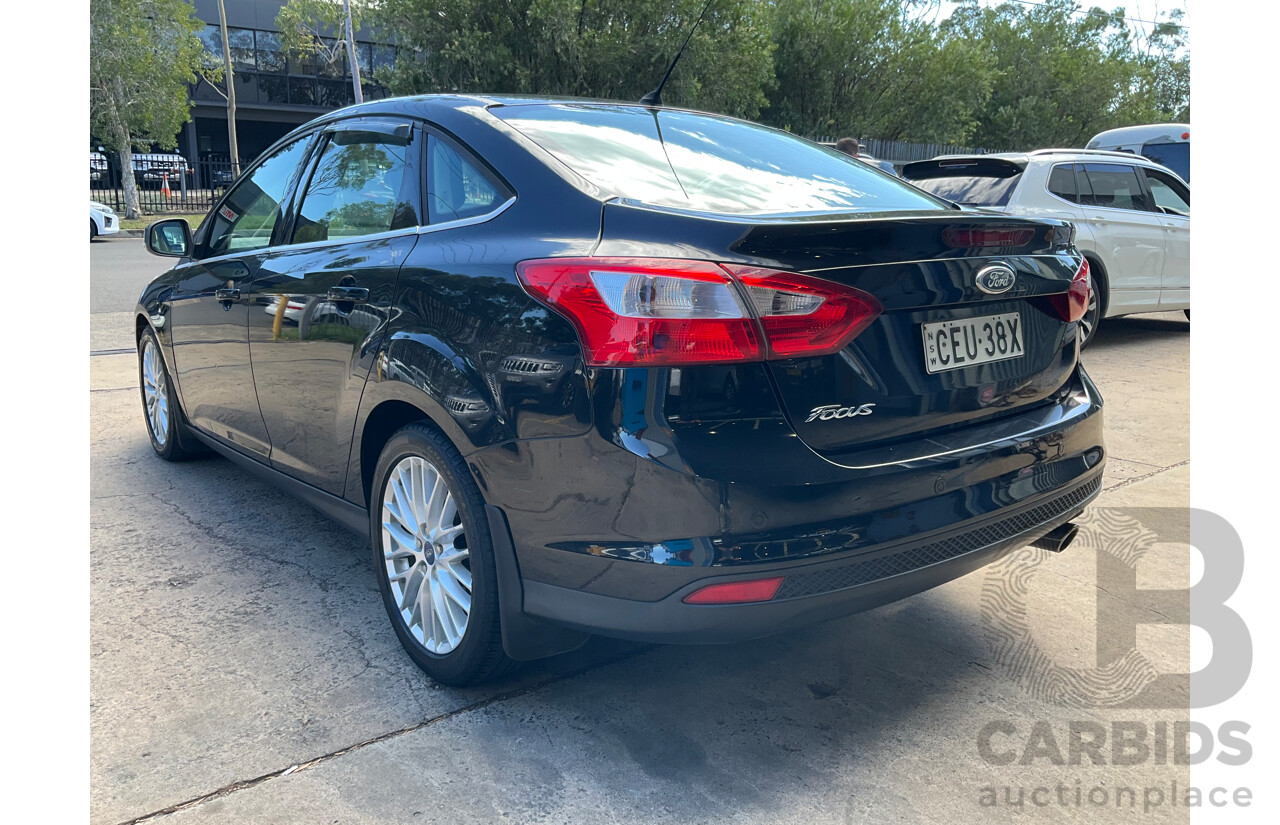10/2011 Ford Focus Titanium LW 4d Sedan Ebony Black Metallic 2.0L