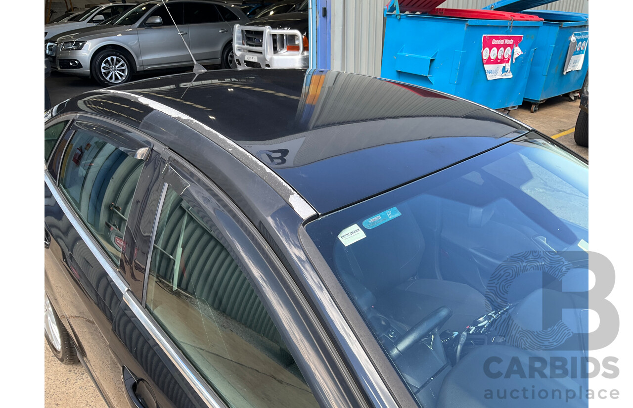 10/2011 Ford Focus Titanium LW 4d Sedan Ebony Black Metallic 2.0L