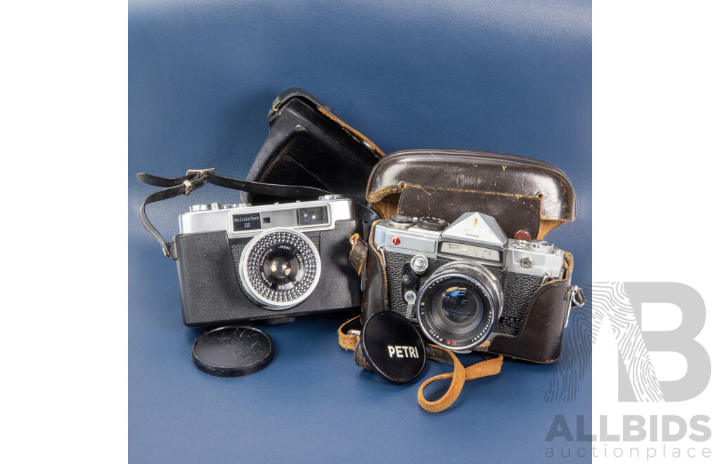 Pair of Vintage SLR Cameras Inc a Petri by Pentax and Yashica