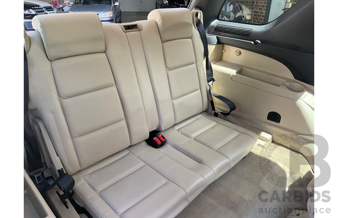 7/2013 Ford Territory Titanium (4x4) SZ 4d Wagon Petroleum Metallic Turbo Diesel 2.7L - 7 Seater