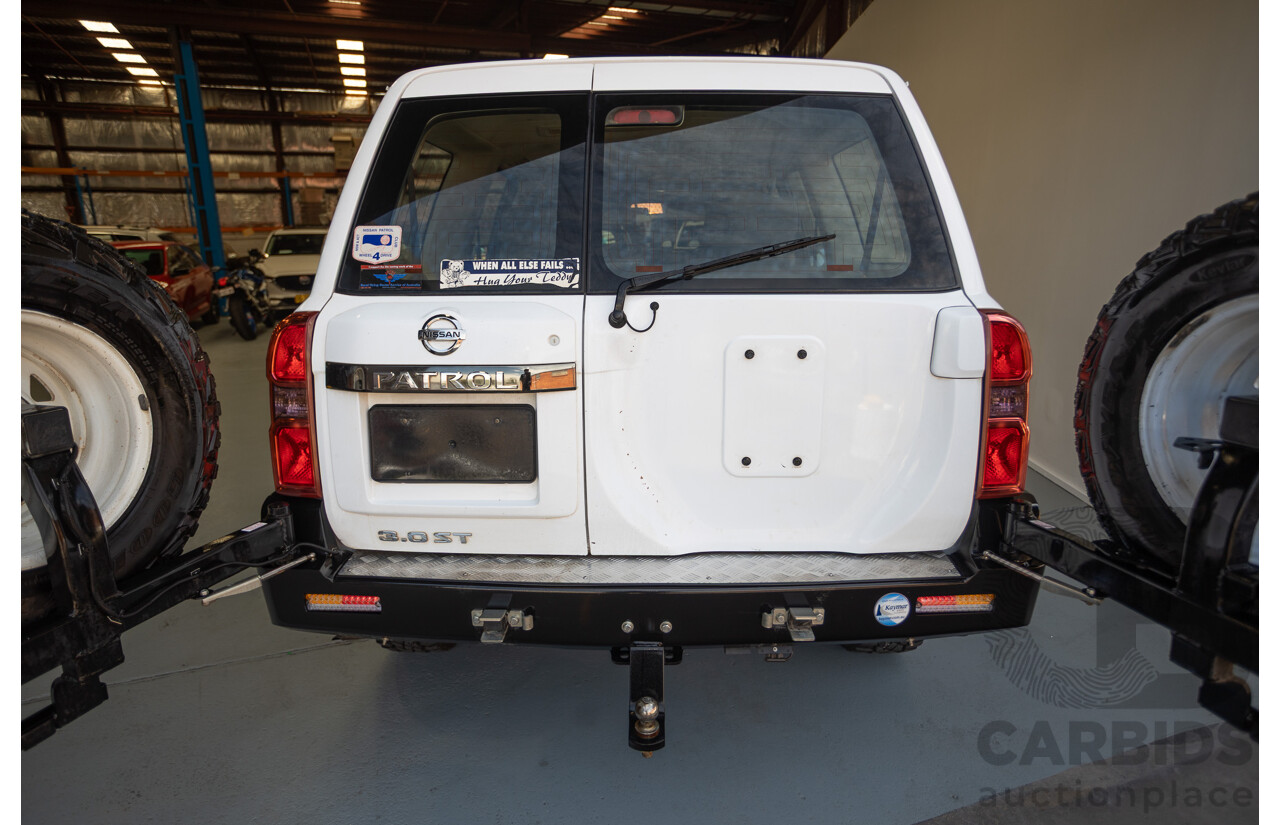 3/2010 Nissan Patrol ST (4x4) GU VI 4d Wagon Polar White Turbo Diesel 3.0L - 7 Seats