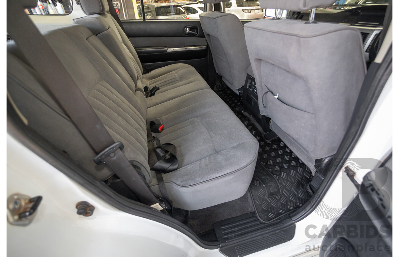 3/2010 Nissan Patrol ST (4x4) GU VI 4d Wagon Polar White Turbo Diesel 3.0L - 7 Seats