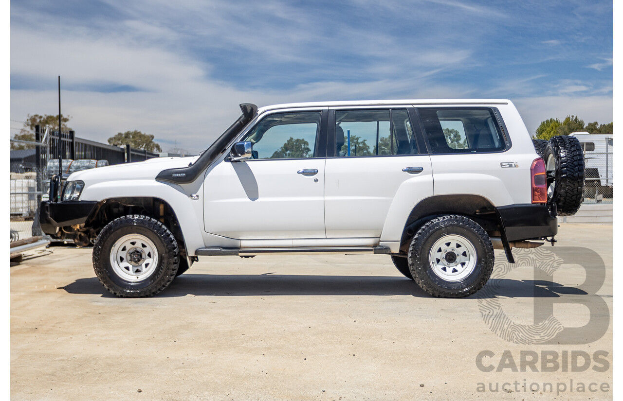 3/2010 Nissan Patrol ST (4x4) GU VI 4d Wagon Polar White Turbo Diesel 3.0L - 7 Seats