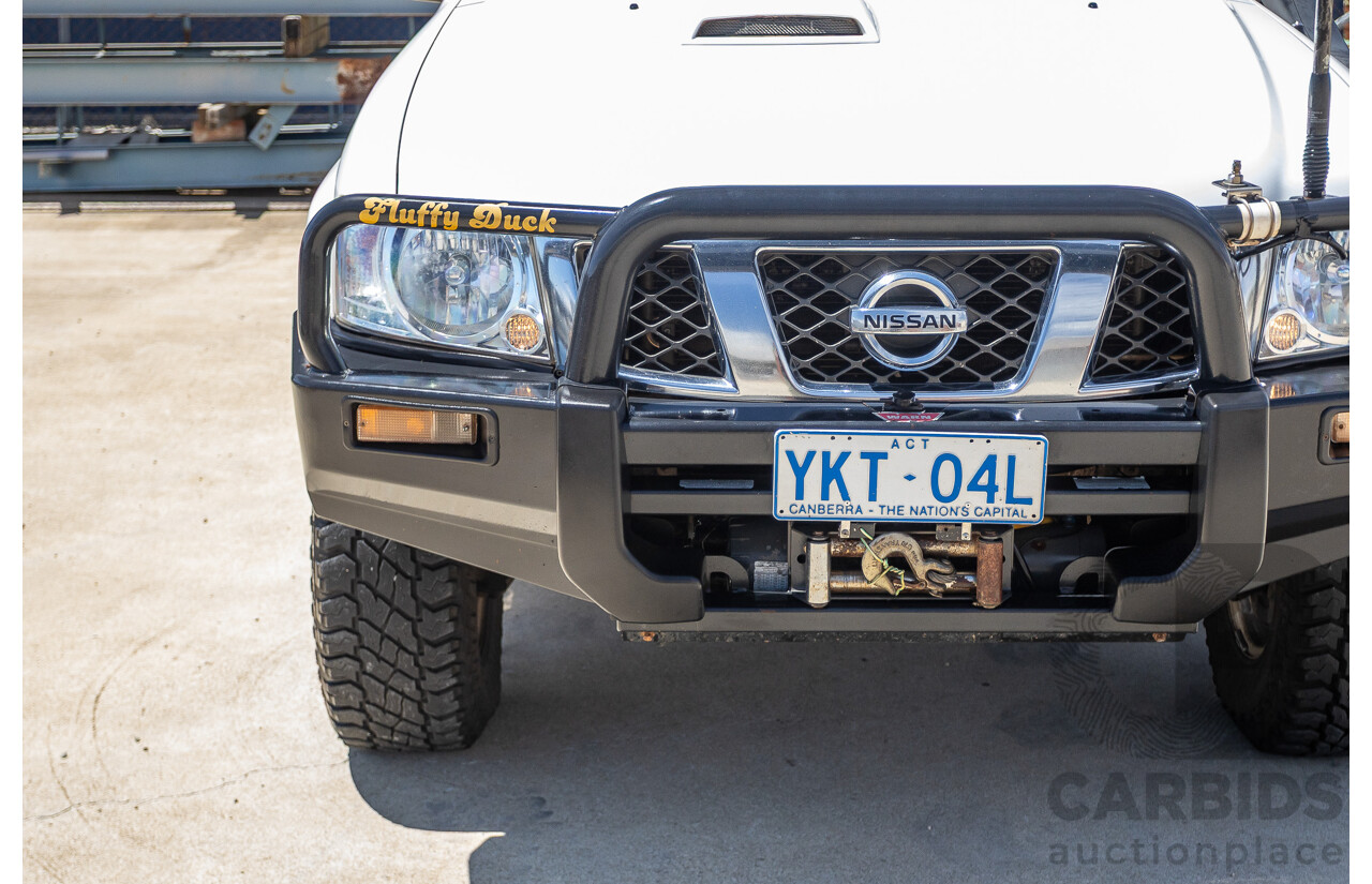 3/2010 Nissan Patrol ST (4x4) GU VI 4d Wagon Polar White Turbo Diesel 3.0L - 7 Seats