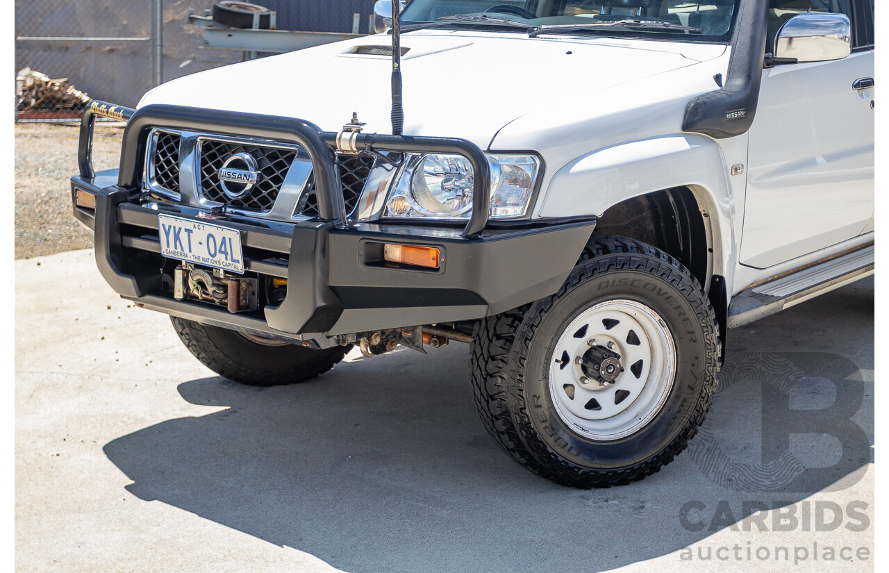 3/2010 Nissan Patrol ST (4x4) GU VI 4d Wagon Polar White Turbo Diesel 3.0L - 7 Seats
